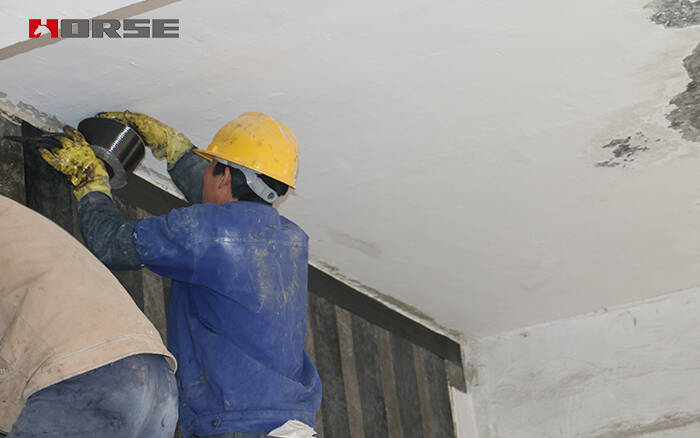 applying carbon fiber fabric for structural strengthening