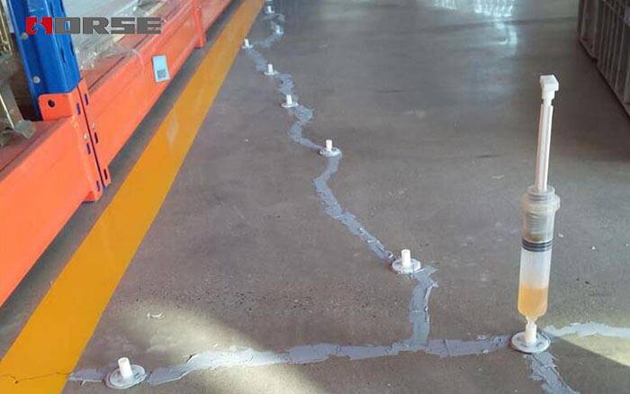 Slab crack repair by epoxy injection adhesive Slab crack repair by epoxy injection adhesive