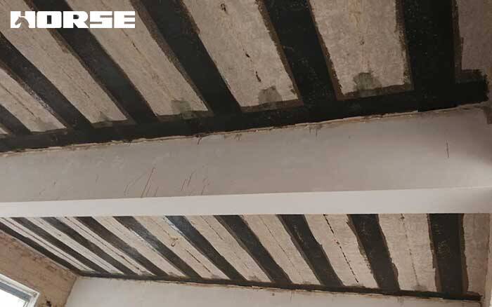 Carbon fiber wrap reinforced concrete slab Carbon fiber wrap reinforced concrete slab