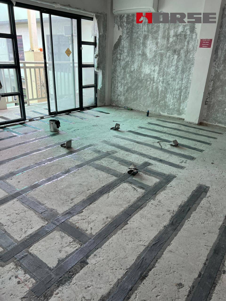 Repair Cracks on Concrete Floor Slab with Crack Injection and Carbon Fiber Sheet