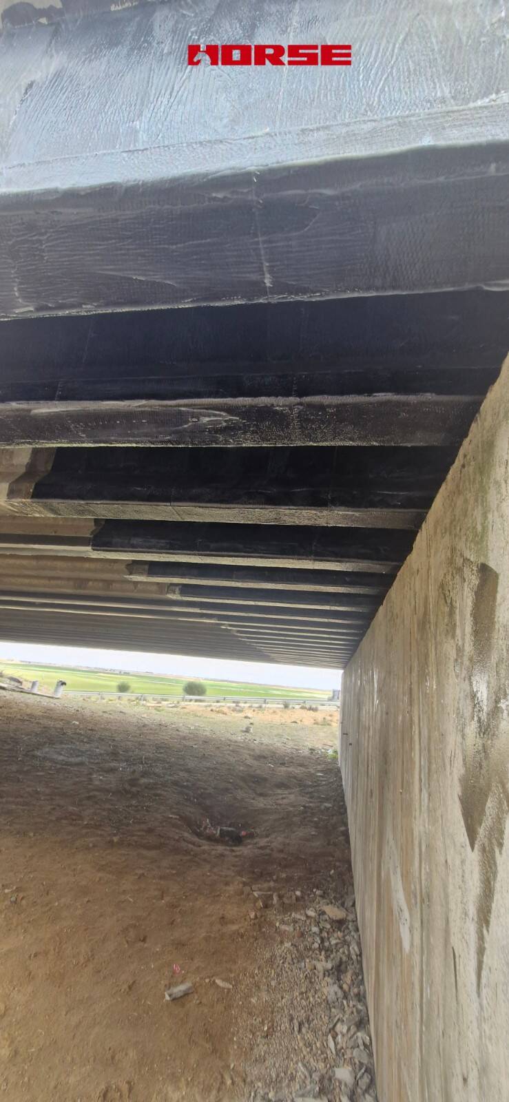 Strengthening of a Prestressed Concrete Multi-Girder Bridge with CFRP Laminate and U-warp Strengthening of a Prestressed Concrete Multi-Girder Bridge with CFRP Laminate and U-warp