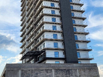 Carbon Fiber Strengthening Holes in an Apartment in Mexico